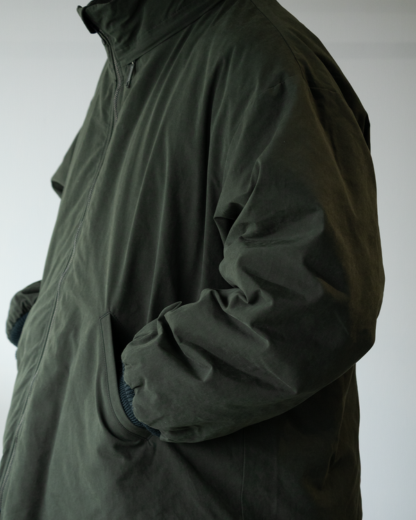 NEEDLES | “HOODED DOWN SUR COAT WAXED HIGH DENSITY”