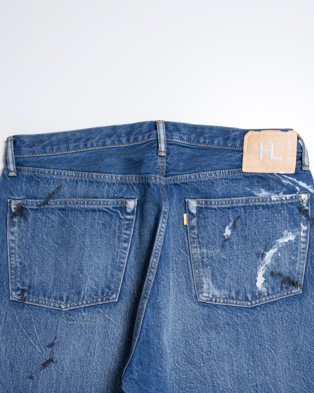 HERILL ラギッドデニムのバックポケットとヴィンテージ加工のアップ