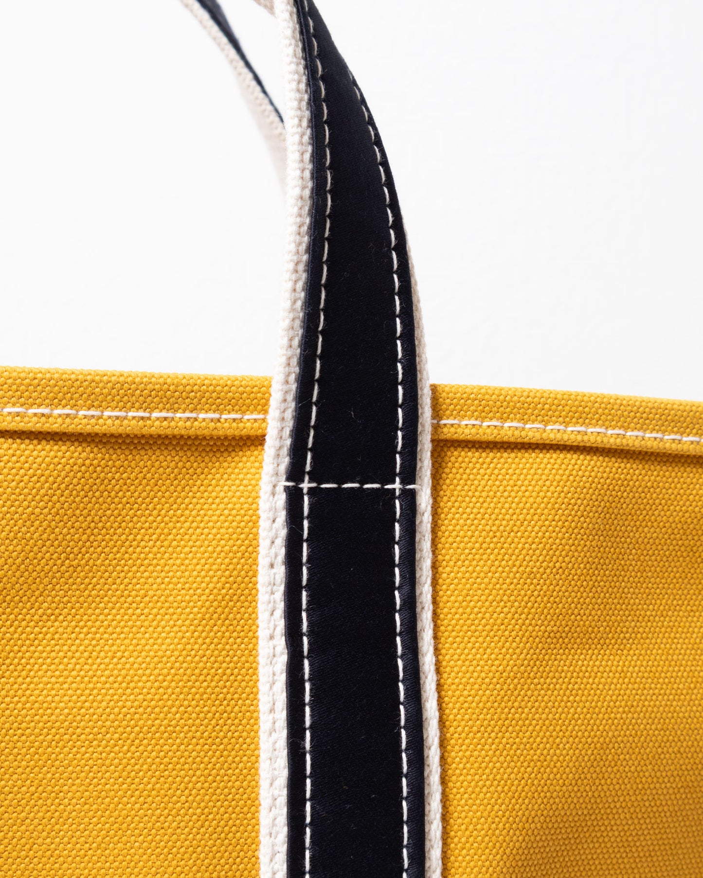 OUTIL ウティ SAC THURY M MUSTARD NAVY トートバッグ ハンドル・配色ディテール（マスタード×ネイビー）
