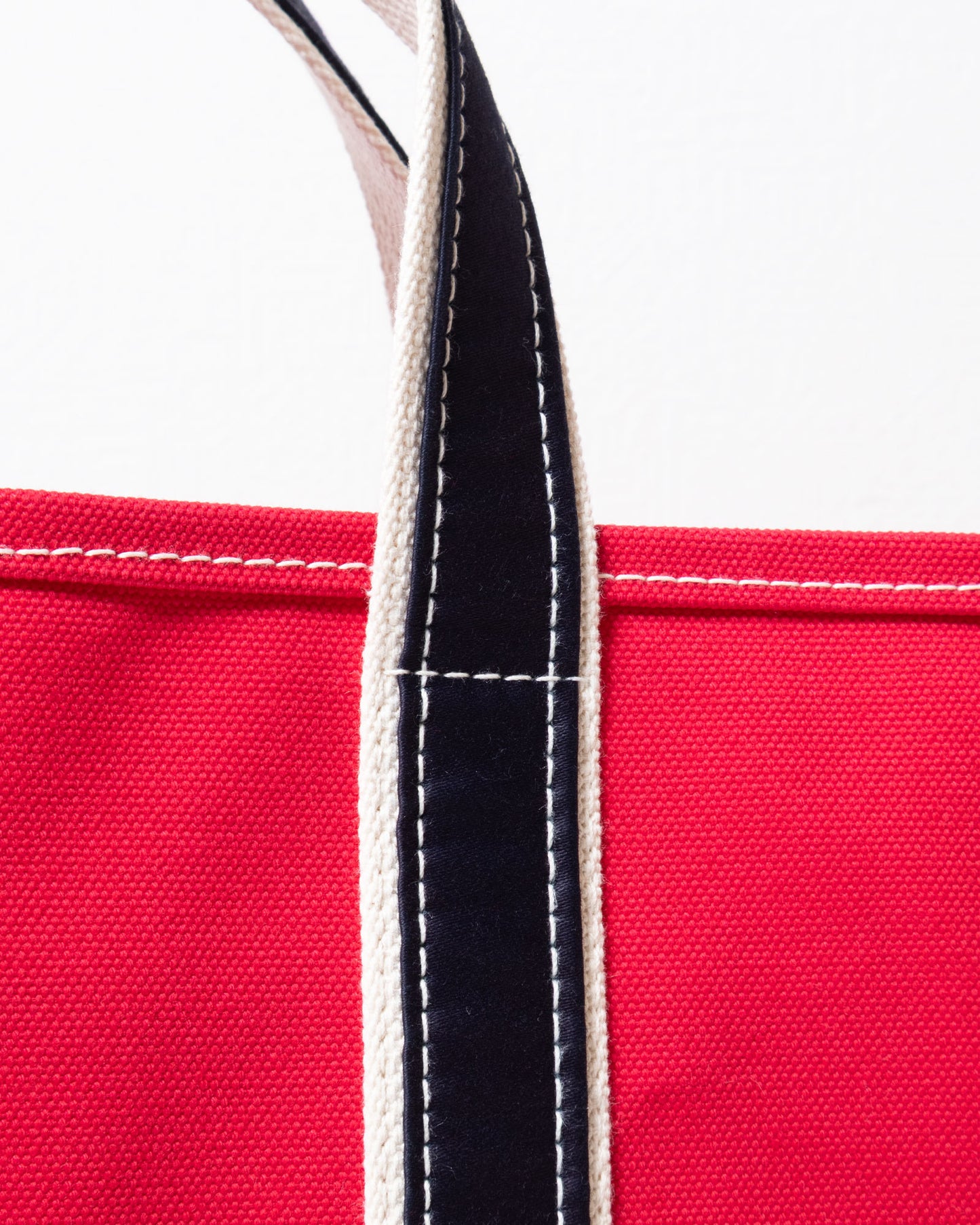 OUTIL ウティ SAC THURY M RED INDIGO トートバッグ ハンドル・配色ディテール（レッド×インディゴ）